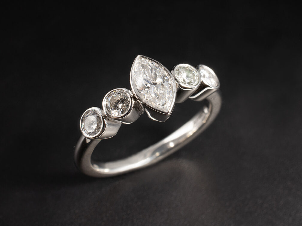 Pear and marquise cut bespoke diamond engagement rings