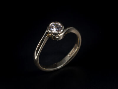 Ladies Lab Grown Diamond Solitaire Engagement Ring, 9kt Yellow Gold Rub over Set Twist Design, Round Brilliant Cut Diamond 0.53ct