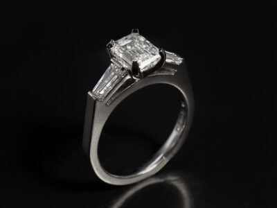 Ladies Lab Grown Diamond Trilogy Engagement Ring, Platinum Claw Set Design, Emerald Cut Lab Grown Diamond 1.31ct E Colour VVS2, Tapered Baguette Cut Diamond Shoulders approx. 5.5 x 3mm