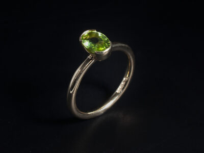 Ladies Solitaire Peridot Dress Ring, 18kt Yellow Gold Part Rub over Design