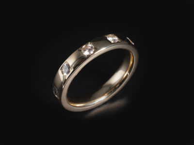 Ladies Diamond Set Dress Ring, 9kt Yellow Gold Court Shaped Secret Set Design, Round Brilliant Cut Diamonds 0.78ct Total (10)