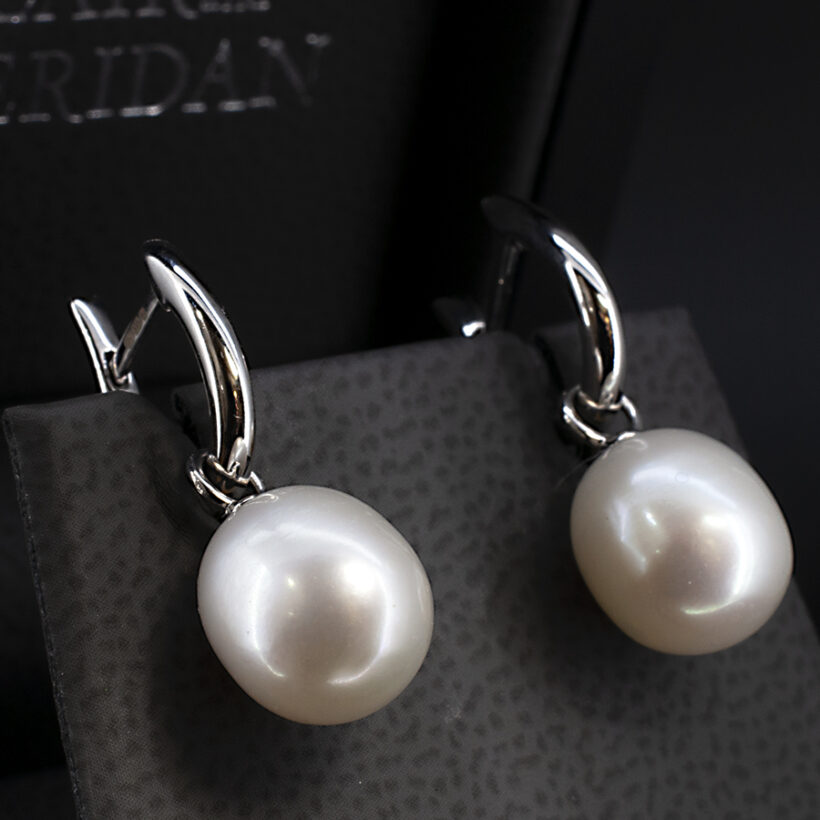 Oval River Pearl Huggie Style Earrings on leverback 9kt White Gold