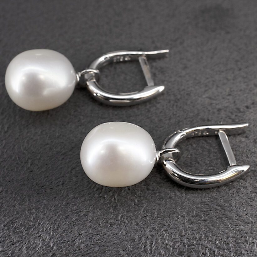 Oval River Pearl Huggie Style Earrings on leverback 9kt White Gold