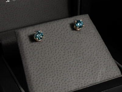 9kt Yellow Gold Blue Diamond Studded Earrings, 4 Claw Basket Set Design, Round Treated Blue Diamonds 0.52ct