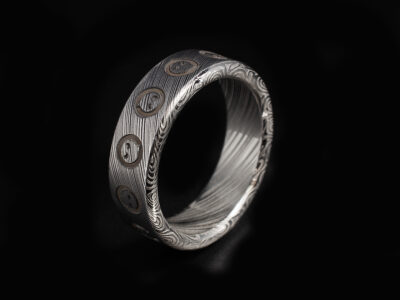 Gents Bespoke Damascus Steel Wedding Ring, Round Edge with Pokemon Laser Engraved Design, 6mm Width, Damascus Heimskringla Pattern